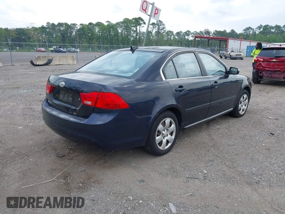 2010 Kia Optima LX z VIN KNAGG4A89A5400338, wystawiony jako IAAI lot #42410076 z przebiegiem 253 870 mil mil oraz . Historia ofert i sprzedaży dostępna na DreamBid. Obrazek 4.