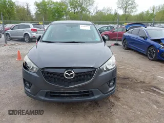 2014 Mazda CX-5 Touring with VIN JM3KE2CYXE0332517, listed as a IAAI auction lot 42109592 with 138,214 mi miles. Bid and sale history available at carsss.com. Image 12.