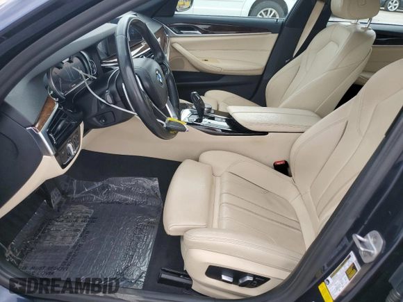 2017 BMW 5 Series 530i with VIN WBAJA5C37HG897385, listed as a Copart auction lot 57414135 with 65,221 mi miles and Salvage title. Bid and sale history available at DreamBid. Image 7.