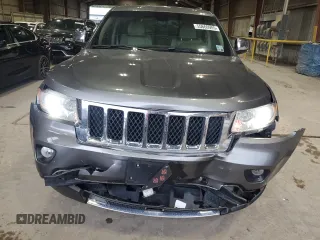 2013 Jeep Grand Cherokee Overland with VIN 1C4RJECT6DC526032, listed as a Copart auction lot 55660905 with 97,406 mi miles and Salvage Title. Bid and sale history available at DreamBid. Image 5.