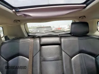 2012 Cadillac SRX Premium Collection z VIN 3GYFNCE39CS526425, wystawiony jako Copart lot #60557615 z przebiegiem 161 217 mil mil oraz Szkoda całkowita • Salvage title. Historia ofert i sprzedaży dostępna na DreamBid. Obrazek 10.