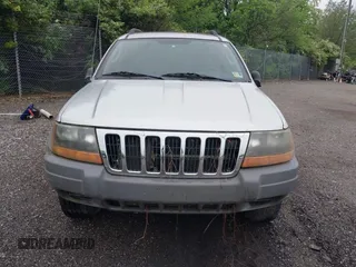 2004 Jeep Grand Cherokee Laredo with VIN 1J4GW48N34C145956, listed as a IAAI auction lot 42201114 with 137,815 mi miles and . Bid and sale history available at DreamBid. Image 5.
