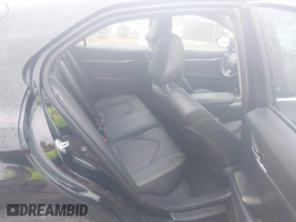 2023 Toyota Camry SE with VIN 4T1G11AKXPU827360, listed as a IAAI auction lot 42217356 with 57,497 mi miles and . Bid and sale history available at DreamBid. Image 8.