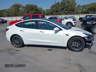 2023 Tesla Model 3 with VIN 5YJ3E1EA9PF585632, listed as a IAAI auction lot 40520993 with 7,775 mi miles and . Bid and sale history available at DreamBid. Image 14.