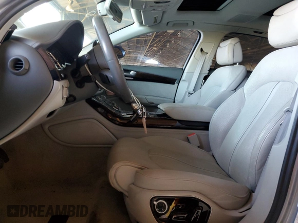2012 Audi A8 with VIN WAURVAFD0CN028037, listed as a Copart auction lot 61004815 with 97,424 mi miles and Salvage title. Bid and sale history available at DreamBid. Image 7.