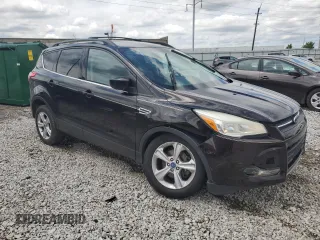 2013 Ford Escape SE with VIN 1FMCU9GX2DUD00349, listed as a Copart auction lot 56070475 with 122,785 mi miles and Salvage title. Bid and sale history available at DreamBid. Image 4.