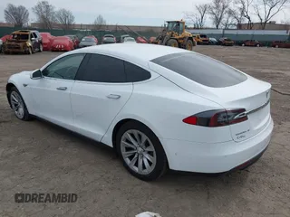2016 Tesla Model S 70 kWh Battery with VIN 5YJSA1E15GF135841, listed as a IAAI auction lot 41846535 with 87,312 mi miles. Bid and sale history available at carsss.com. Image 3.