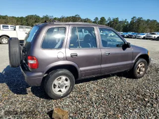 2000 Kia Sportage with VIN KNDJB7237Y5683960, listed as a Copart auction lot 75192944 with 127,615 mi miles and Salvage Title. Bid and sale history available at carsss.com. Image 3.