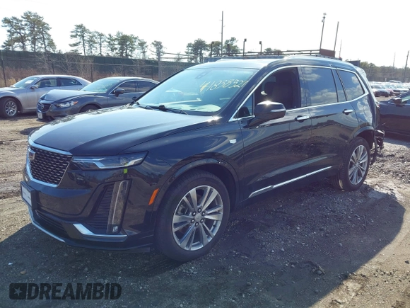 2023 Cadillac XT6 AWD Premium Luxury with VIN 1GYKPDRS8PZ153838, listed as a IAAI auction lot 41838527 with 60,034 mi miles and . Bid and sale history available at DreamBid. Image 2.