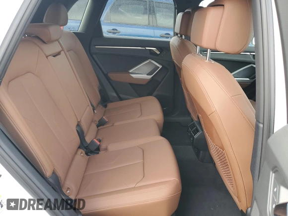 2023 Audi Q3 S line Premium z VIN WA1DECF3XP1144319, wystawiony jako Copart lot #50177425 z przebiegiem 10 785 mil mil oraz Szkoda całkowita • Salvage title. Historia ofert i sprzedaży dostępna na DreamBid. Obrazek 11.
