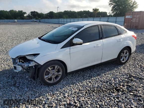 2014 Ford Focus SE with VIN 1FADP3F27EL412368, listed as a Copart auction lot 51463155 with 143,484 mi miles and Salvage Title. Bid and sale history available at DreamBid. Image 1.