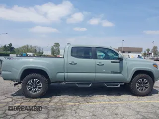 2022 Toyota Tacoma SR5 with VIN 3TMBZ5DN1NM035572, listed as a IAAI auction lot 42083925 with 82,596 mi miles and . Bid and sale history available at DreamBid. Image 14.
