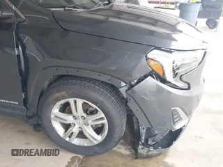 2020 GMC Terrain SLE z VIN 3GKALMEV3LL275686, wystawiony jako IAAI lot #41657384 z przebiegiem 97 501 mil mil oraz . Historia ofert i sprzedaży dostępna na DreamBid. Obrazek 6.