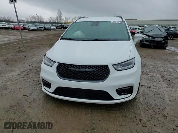 2021 Chrysler Pacifica Touring L with VIN 2C4RC3BG3MR525690, listed as a Copart auction lot 83658704 with 51,389 mi miles and Salvage title. Bid and sale history available at DreamBid. Image 12.