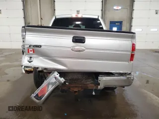 2011 Ford F-150 XLT with VIN 1FTFW1ET3BFC87187, listed as a Copart auction lot 61072695 with 156,365 mi miles and Salvage title. Bid and sale history available at DreamBid. Image 6.