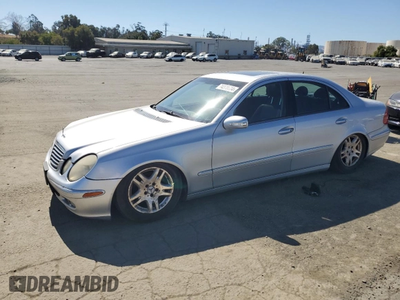 2003 Mercedes-Benz E-Class 3.2L with VIN WDBUF65JX3A096821, listed as a Copart auction lot 74378684 with 157,088 mi miles and Clean Title. Bid and sale history available at carsss.com. Image 1.