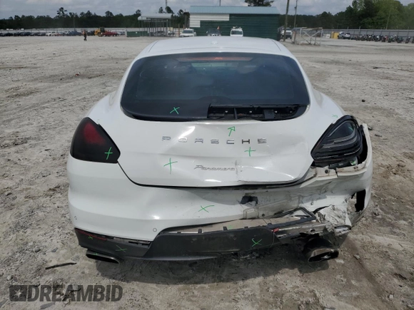 2014 Porsche Panamera z VIN WP0AA2A76EL010143, wystawiony jako Copart lot #54750715 z przebiegiem 132 333 mil mil oraz Szkoda całkowita • Salvage title. Historia ofert i sprzedaży dostępna na DreamBid. Obrazek 6.