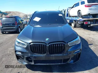 2019 BMW X5 xDrive50i with VIN 5UXJU2C5XKLN66873, listed as a IAAI auction lot 41472246 with 98,571 mi miles. Bid and sale history available at carsss.com. Image 11.