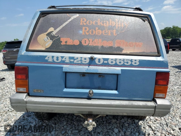 1991 Jeep Cherokee z VIN 1J4FJ58S0ML519252, wystawiony jako Copart lot #55458005 z przebiegiem 152 129 mil mil oraz Szkoda całkowita • Salvage title. Historia ofert i sprzedaży dostępna na DreamBid. Obrazek 6.