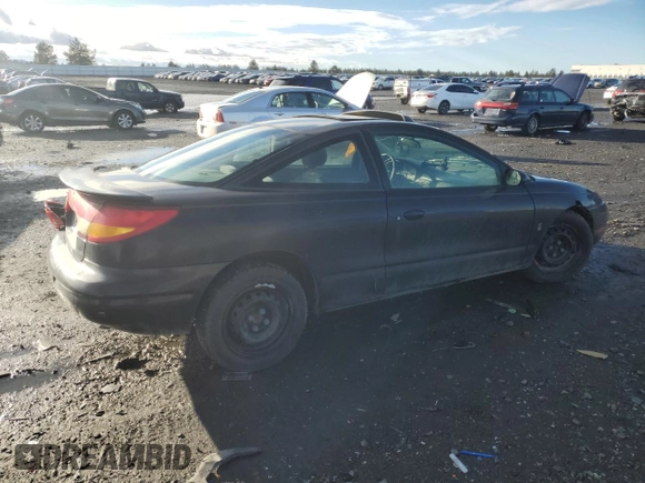 2000 Saturn SC with VIN 1G8ZY1273YZ152453, listed as a Copart auction lot 84834784 with Not Provided miles and Salvage Title. Bid and sale history available at carsss.com. Image 3.