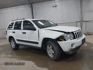 2006 Jeep Grand Cherokee Laredo with VIN 1J8GR48K06C163877, listed as a IAAI auction lot 41971240 with 250,544 mi miles. Bid and sale history available at carsss.com. Image 1.