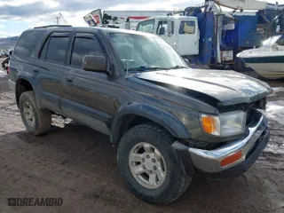 1998 Toyota 4Runner Limited with VIN JT3HN87RXW0143333, listed as a IAAI auction lot 41671214 with 233,600 mi miles. Bid and sale history available at carsss.com. Image 1.