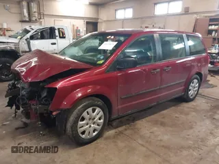 2014 Dodge Grand Caravan SE with VIN 2C4RDGBG5ER379315, listed as a IAAI auction lot 41673071 with 168,569 mi miles and . Bid and sale history available at DreamBid. Image 18.