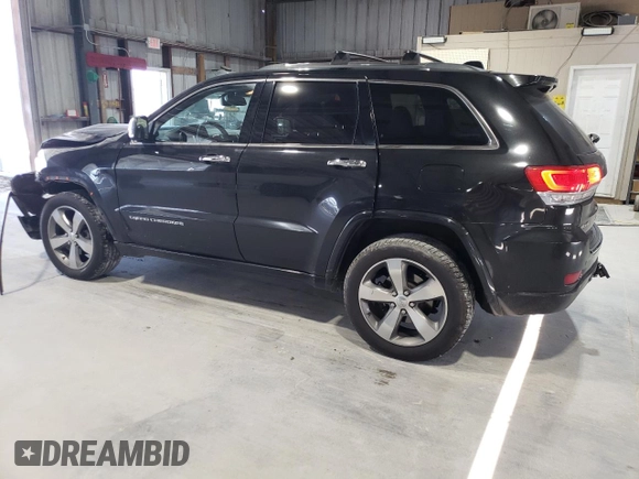 2015 Jeep Grand Cherokee Overland with VIN 1C4RJFCG0FC783375, listed as a Copart auction lot 61966725 with 191,478 mi miles and Salvage title. Bid and sale history available at DreamBid. Image 2.
