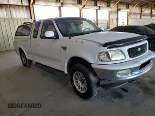1998 Ford F-150 с VIN 1FTRX18L0WKA53124, выставлен на аукционе Copart как лот 66466945 с пробегом 252 908 миль миль и Чистый • Clean title. История ставок и продаж доступна на DreamBid. Изображение 4.