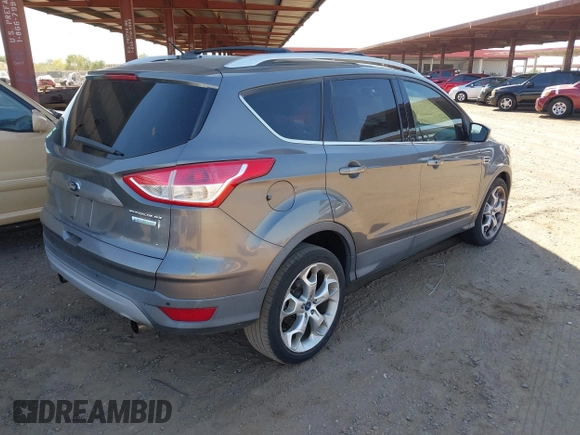 2013 Ford Escape Titanium with VIN 1FMCU0J95DUA29390, listed as a IAAI auction lot 42720269 with 147,413 mi miles and . Bid and sale history available at DreamBid. Image 4.