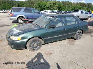 2002 Toyota Corolla CE с VIN 1NXBR12E22Z570523, выставлен на аукционе Copart как лот 53756145 с пробегом 226 245 миль миль и Чистый • Clean title. История ставок и продаж доступна на DreamBid. Изображение 1.