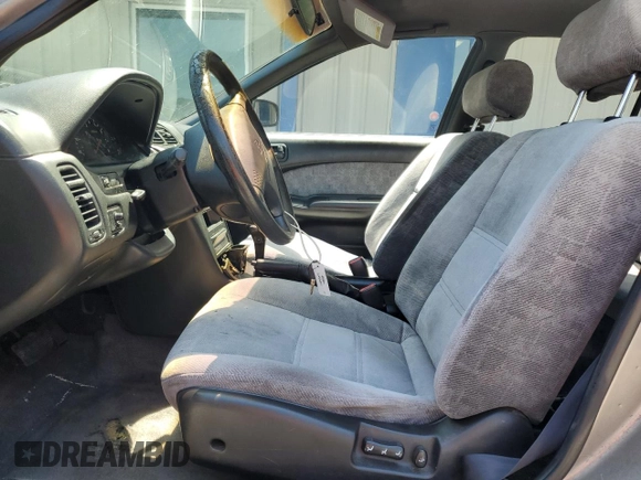 1998 Nissan Maxima GXE с VIN JN1CA21D0WT525657, выставлен на аукционе Copart как лот 57055485 с пробегом Не указан миль и Списание • Salvage title. История ставок и продаж доступна на DreamBid. Изображение 7.