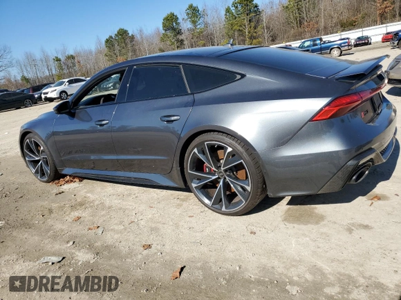 2022 Audi RS 7 z VIN WUAPCBF22NN912345, wystawiony jako Copart lot #41202044 z przebiegiem 5076 mil mil oraz Szkody całkowita. Historia ofert i sprzedaży dostępna na DreamBid. Obrazek 2.