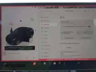 2023 Tesla Model Y Long Range z VIN 7SAYGDEEXPA181114, wystawiony jako IAAI lot #41564617 z przebiegiem 64 990 mil mil oraz . Historia ofert i sprzedaży dostępna na DreamBid. Obrazek 18.