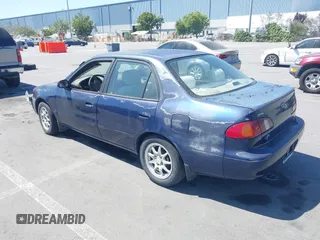 1998 Toyota Corolla VE z VIN 2T1BR18E4WC099280, wystawiony jako IAAI lot #42624278 z przebiegiem 129 901 mil mil oraz . Historia ofert i sprzedaży dostępna na DreamBid. Obrazek 3.