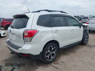 2014 Subaru Forester XT Touring with VIN JF2SJGMC4EH555465, listed as a IAAI auction lot 42357371 with 168,378 mi miles and . Bid and sale history available at DreamBid. Image 4.
