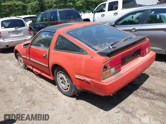 1986 Nissan 300ZX z VIN JN1HZ14S4GX164916, wystawiony jako IAAI lot #42295717 z przebiegiem 254 114 mil mil oraz . Historia ofert i sprzedaży dostępna na DreamBid. Obrazek 3.