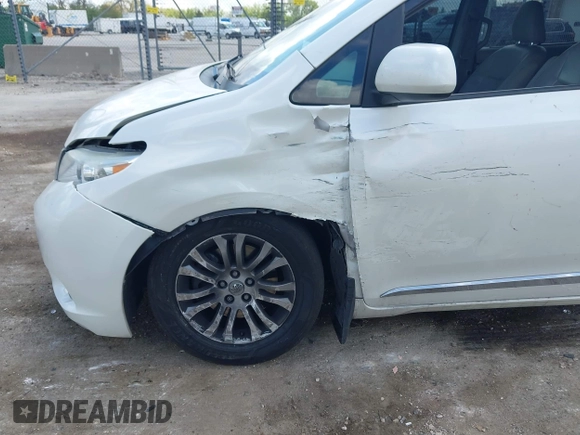 2016 Toyota Sienna XLE with VIN 5TDYK3DC4GS702638, listed as a IAAI auction lot 42255793 with 124,977 mi miles and . Bid and sale history available at DreamBid. Image 6.