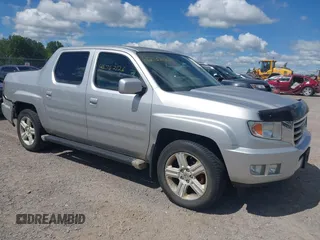 2013 Honda Ridgeline RTL with VIN 5FPYK1F51DB007236, listed as a IAAI auction lot 42762126 with 201,758 mi miles and . Bid and sale history available at DreamBid. Image 1.