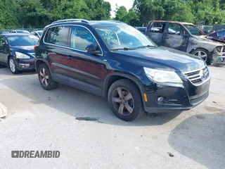 2010 Volkswagen Tiguan with VIN WVGAV9AX4AW513705, listed as a IAAI auction lot 42756432 with 212,980 mi miles and . Bid and sale history available at DreamBid. Image 1.