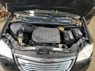2013 Chrysler Town & Country Touring with VIN 2C4RC1BGXDR743713, listed as a Copart auction lot 65724154 with 241,852 mi miles and Salvage Title. Bid and sale history available at DreamBid. Image 14.