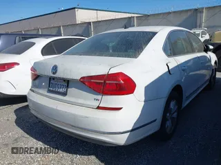 2016 Volkswagen Passat S with VIN 1VWAT7A3XGC036460, listed as a IAAI auction lot 42466059 with 91,672 mi miles and . Bid and sale history available at DreamBid. Image 4.