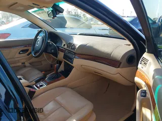 2000 BMW 5 Series 528iA with VIN WBADM6343YGU12629, listed as a IAAI auction lot 41963814 with 206,922 mi miles. Bid and sale history available at carsss.com. Image 5.