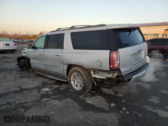 2016 GMC Yukon XL SLE with VIN 1GKS2FKC0GR167871, listed as a Copart auction lot 85446244 with 137,138 mi miles and Salvage Title. Bid and sale history available at DreamBid. Image 2.