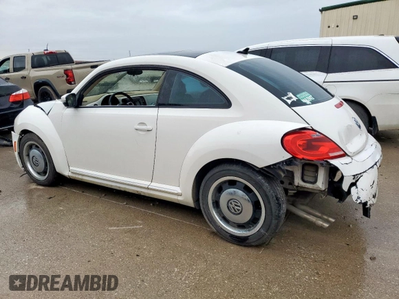 2013 Volkswagen Beetle 2.5L w/Sun/Sound/Nav with VIN 3VWJX7ATXDM610778, listed as a Copart auction lot 55654045 with Not Provided miles and Salvage Title. Bid and sale history available at DreamBid. Image 2.