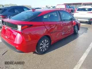 2020 Toyota Prius LE with VIN JTDL9RFU8L3019030, listed as a IAAI auction lot 41973490 with 58,361 mi miles and . Bid and sale history available at DreamBid. Image 4.