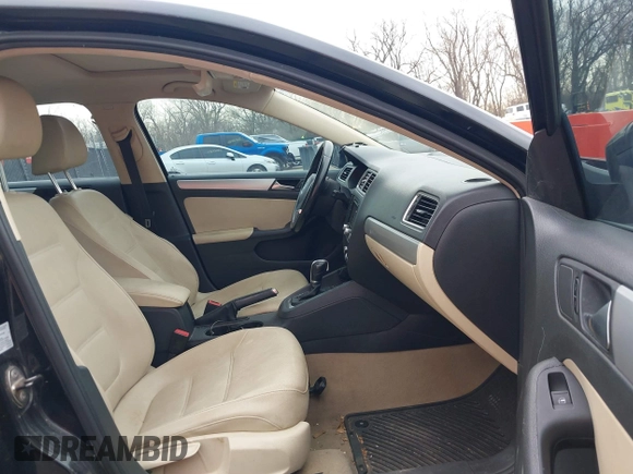 2012 Volkswagen Jetta TDI w/Premium with VIN 3VWLL7AJ9CM367840, listed as a IAAI auction lot 41868444 with 176,486 mi miles and . Bid and sale history available at DreamBid. Image 5.