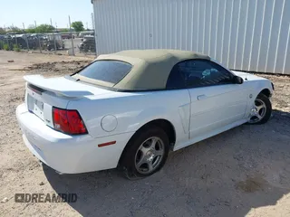 2004 Ford Mustang Deluxe with VIN 1FAFP44674F134492, listed as a IAAI auction lot 42562080 with 145,600 mi miles and . Bid and sale history available at DreamBid. Image 4.
