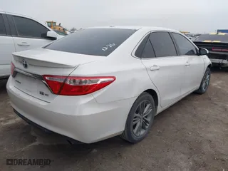 2015 Toyota Camry Hybrid LE with VIN 4T1BD1FK0FU175597, listed as a IAAI auction lot 41455315 with 116,380 mi miles. Bid and sale history available at carsss.com. Image 4.