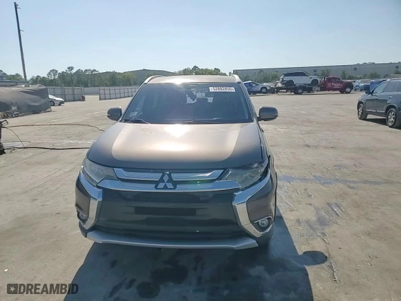 2016 Mitsubishi Outlander SE with VIN JA4AD3A37GZ005473, listed as a Copart auction lot 52882855 with 109,651 mi miles and Salvage Title. Bid and sale history available at carsss.com. Image 14.